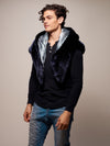 Man wearing faux fur Collector Edition Ice Wolf Shawl SpiritHood, side view 2