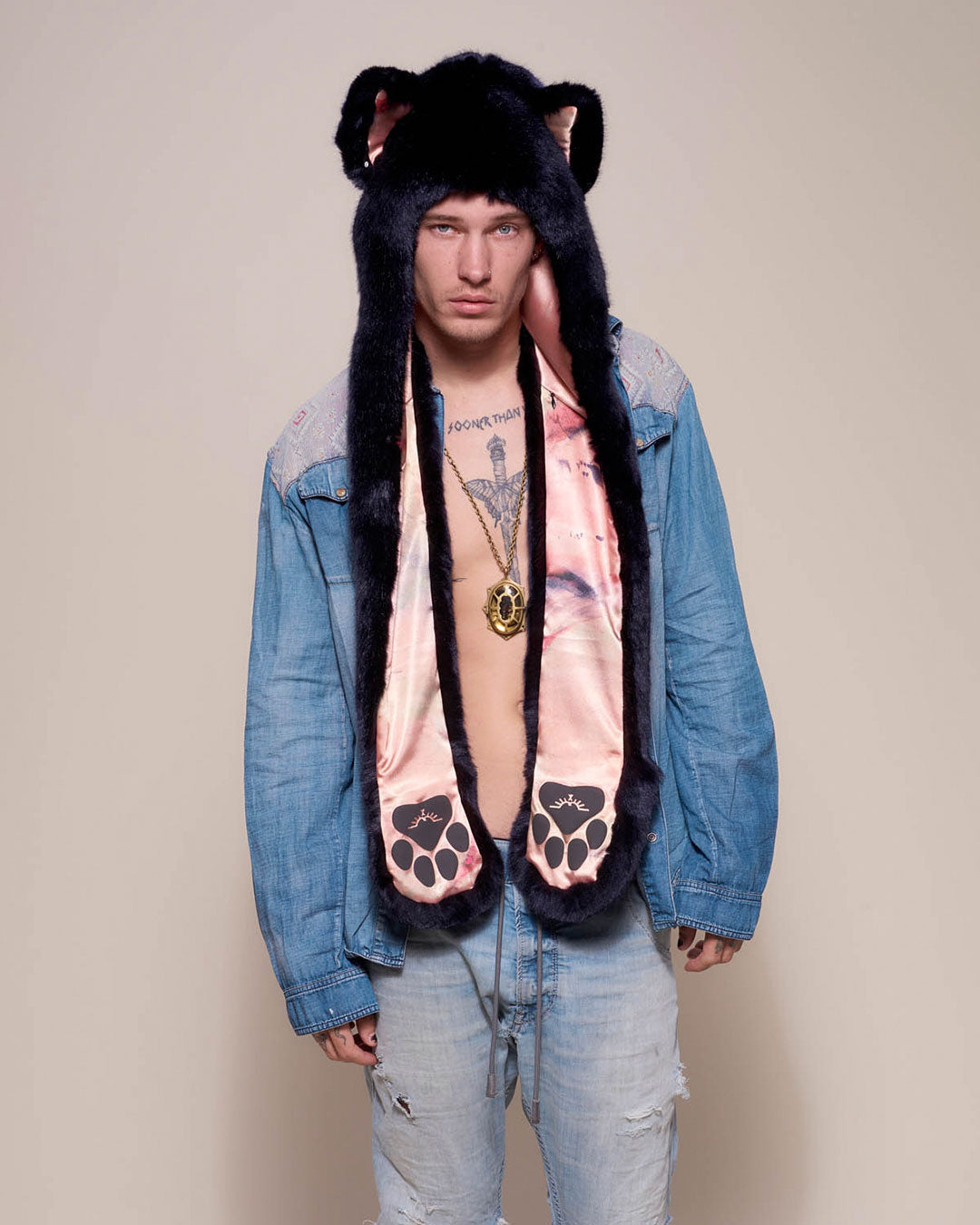 Man wearing Indigo Wolf Luxe Collector Edition Faux Fur Hood, front view 1