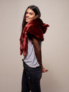 Woman wearing faux fur CE Drogon Wolf Shawl SpiritHood, side view 1