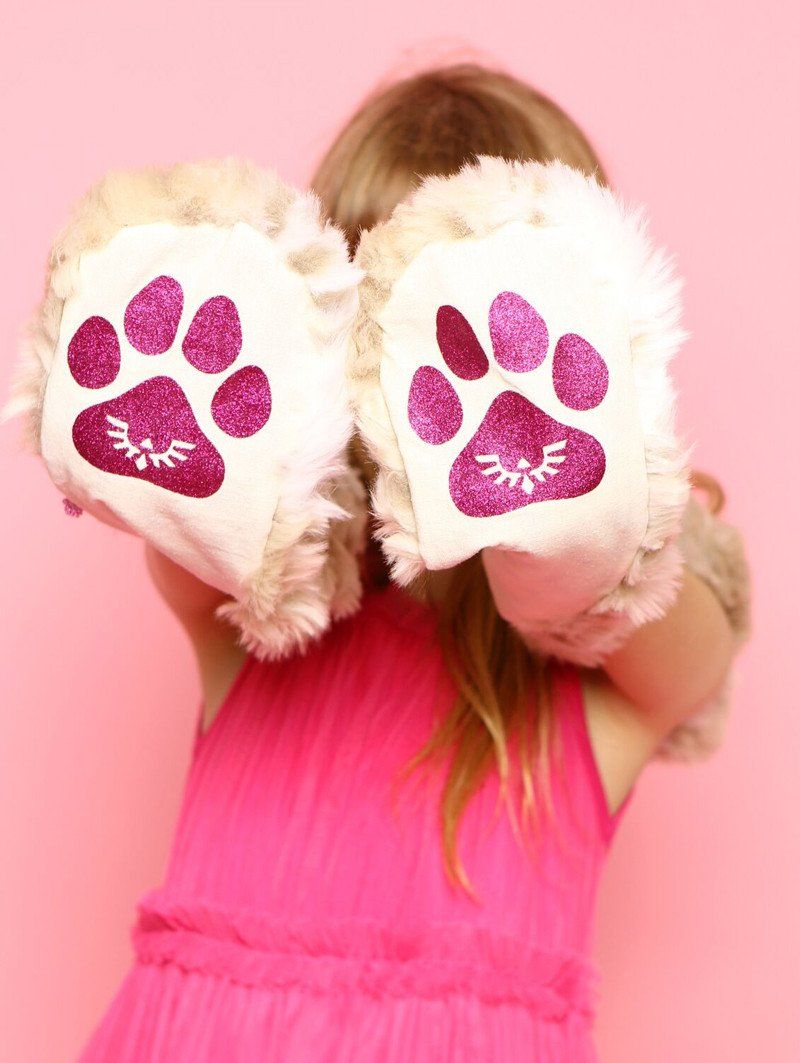 Logos on Paws of SpiritHood for Kids Featuring Faux Fur in Snow Leopard Design