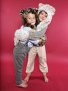 Hugging Boy and Girl Wearing Faux Fur SpiritHood for Kids in Snow Leopard Design