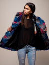 Woman wearing Lovebird Alpaca Vest, front view 3