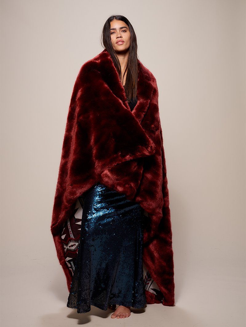 Woman wearing faux fur Luxury Garnet Throw