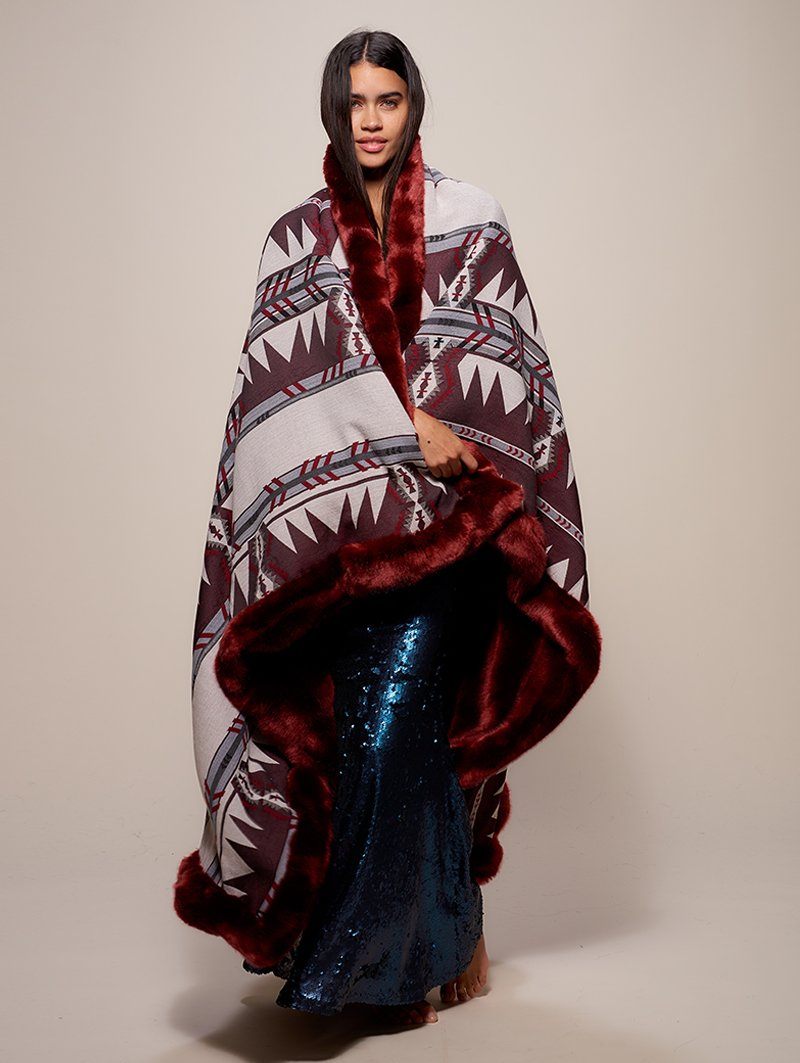 Woman wearing faux fur Luxury Garnet Throw, front view 1