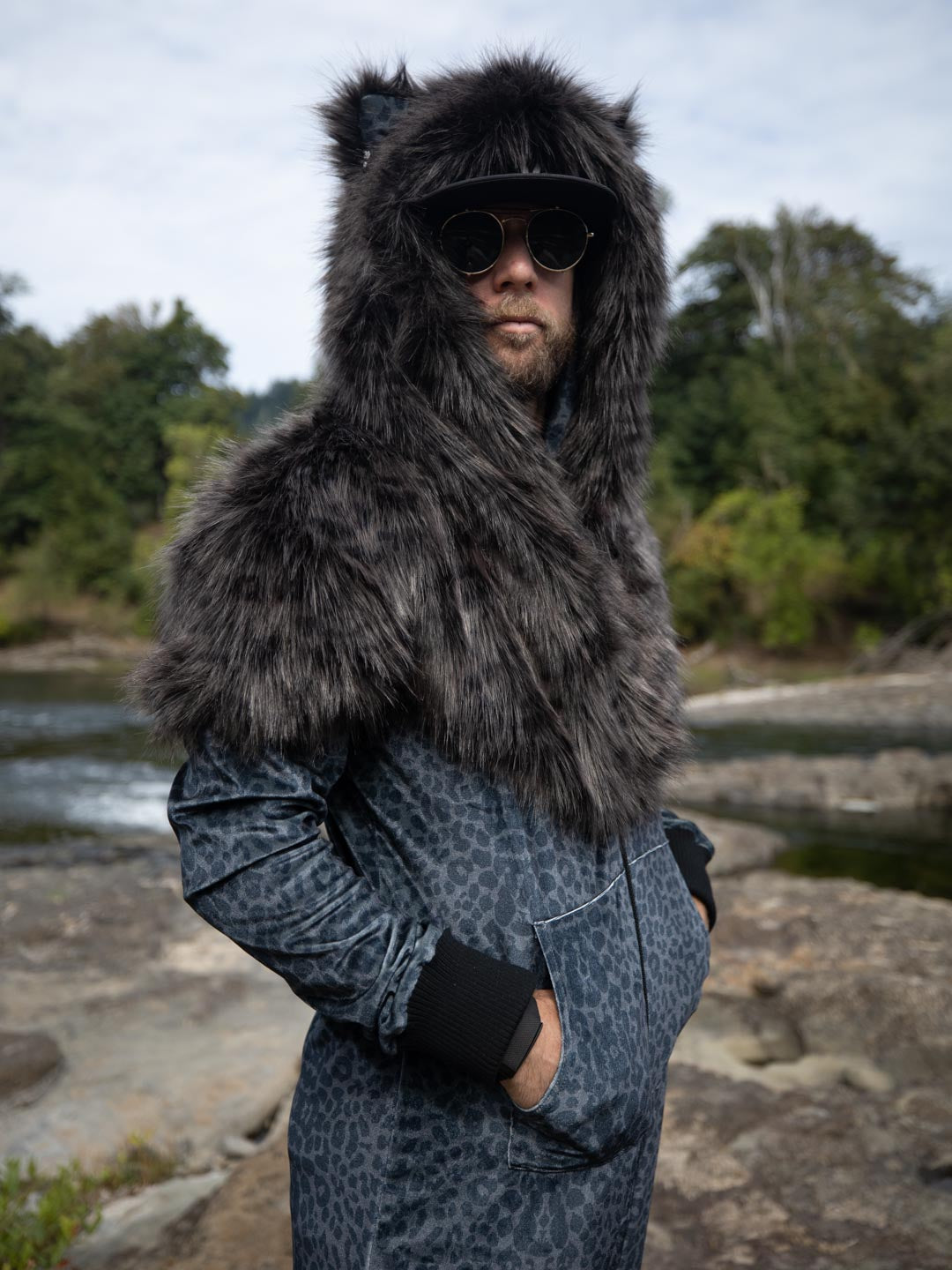 Black Panther Velvet Classic Faux Fur Animal Onesie is Featured on a Male Model Wearing Sunglasses