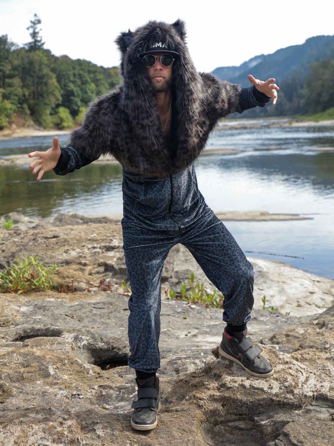 Pretend Attack by the Black Panther Velvet Faux Fur Onesie Male Model