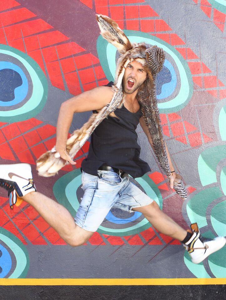 Man wearing faux fur Hybrid Bunny Collectors Edition SpiritHood
