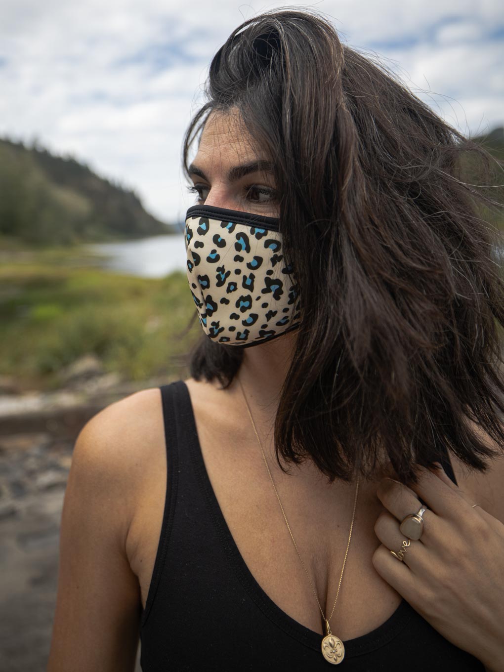 Woman wearing Blue Spotted Leopard Copper-Threaded Face Mask, side view 1