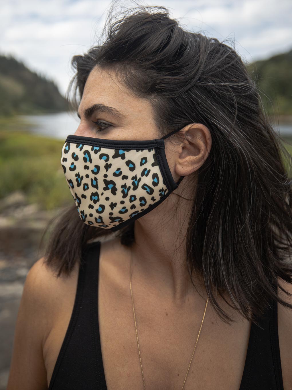 Woman wearing Blue Spotted Leopard Copper-Threaded Face Mask, side view 2