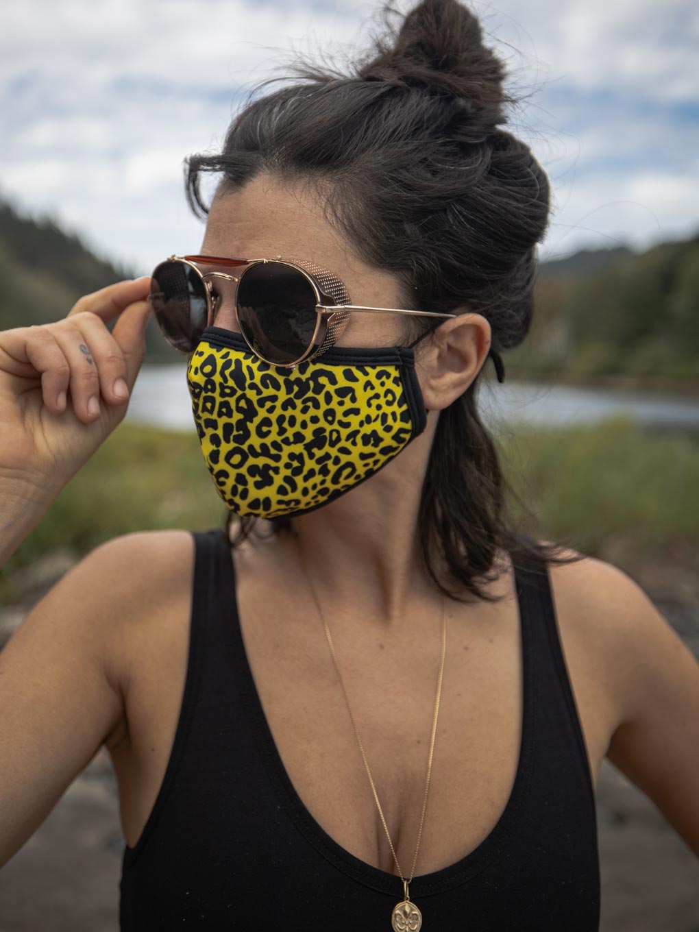 Female Wearing Neon Yellow Cheetah Face Mask