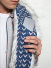 Man wearing faux fur Husky Arrows SpiritHood, front view 2