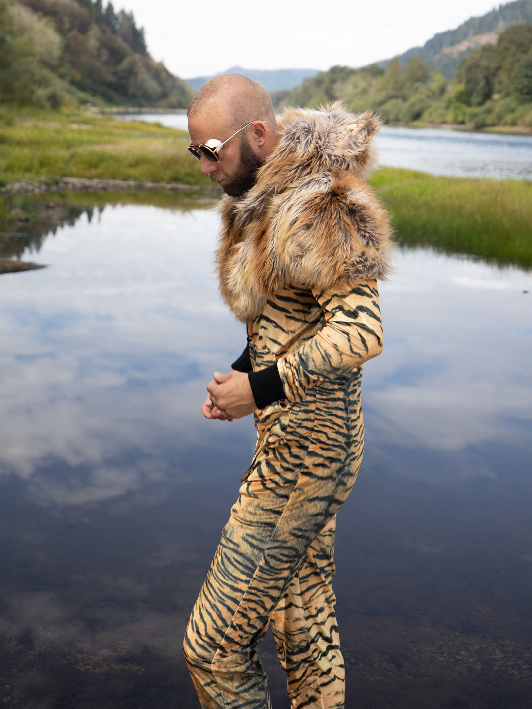 Man wearing Liger Velvet Classic Faux Fur Animal Onesie, side view 2