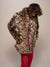 Man wearing Leopard Collared Faux Fur Coat, side view