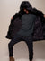 Man wearing Black Wolf Hooded Faux Fur Coat, front view 3