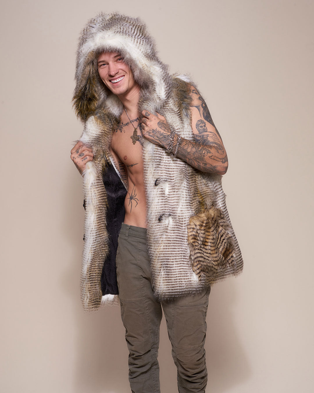 Man wearing Alaskan Hawk Hooded Faux Fur Vest