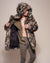 Man wearing Brindle Wolf Hooded Faux Fur Coat, front view