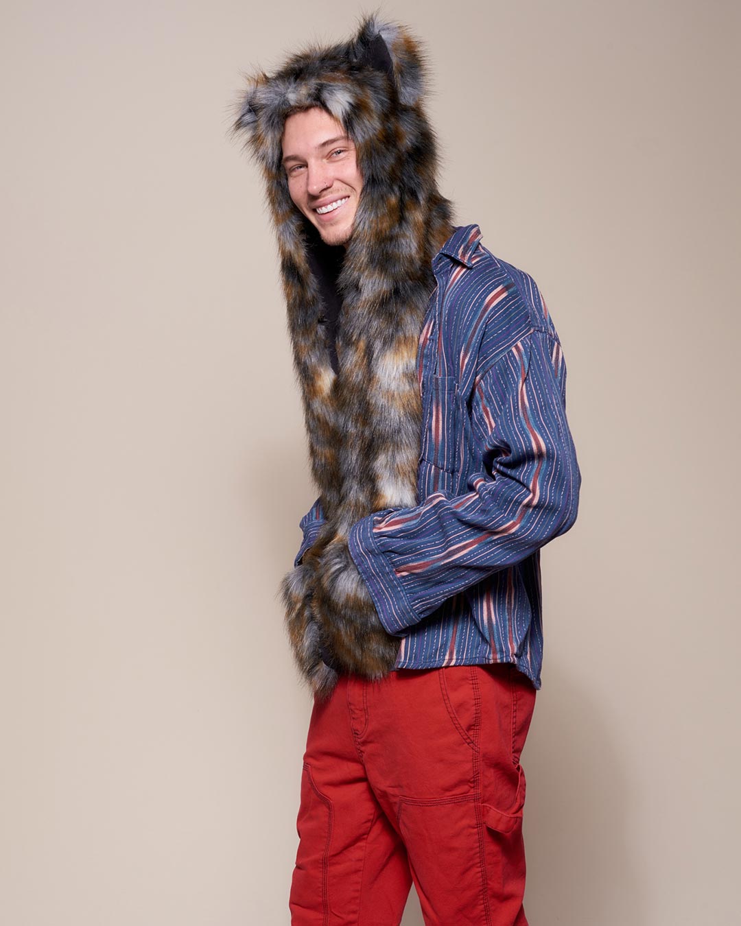 Man wearing Brindle Wolf Collector Edition Faux Fur Hood, side view 4