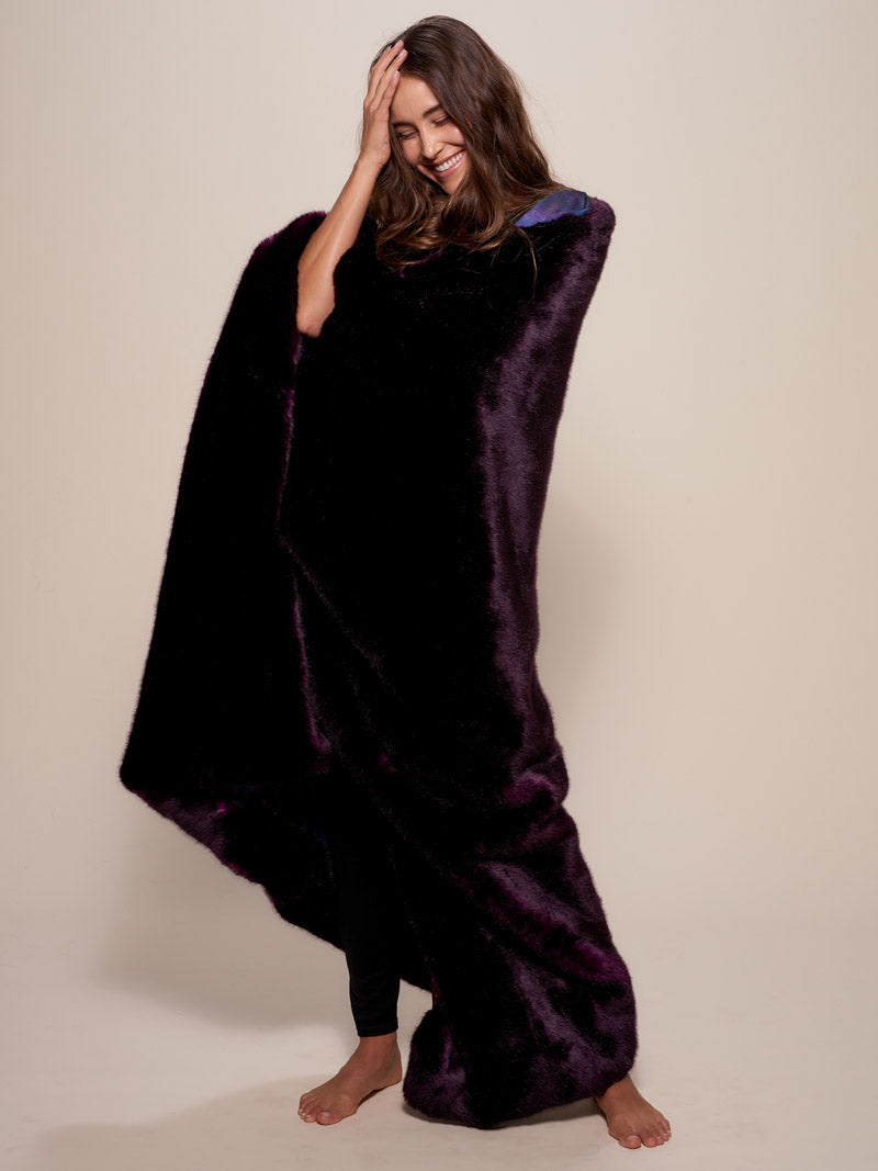 Woman Wrapped in Luxe Midnight Wolf Limited Edition Galaxy Faux Fur Throw Blanket