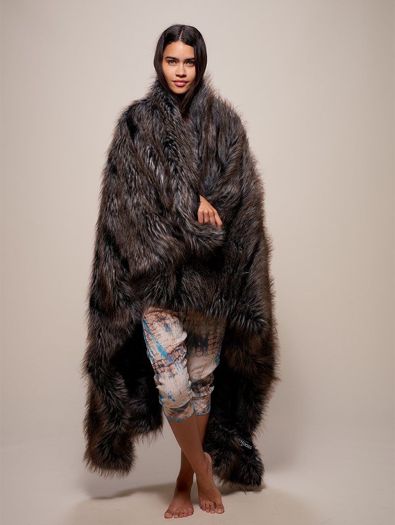 Woman Wrapped Up in Night Fox Faux Fur Throw 