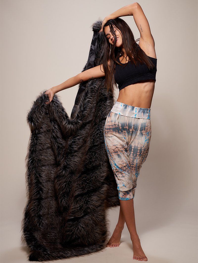 Night Fox Faux Fur Throw Blanket Held by Female Model