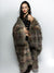 Woman Wrapped in NightHawk Limited Edition Faux Fur Throw Blanket