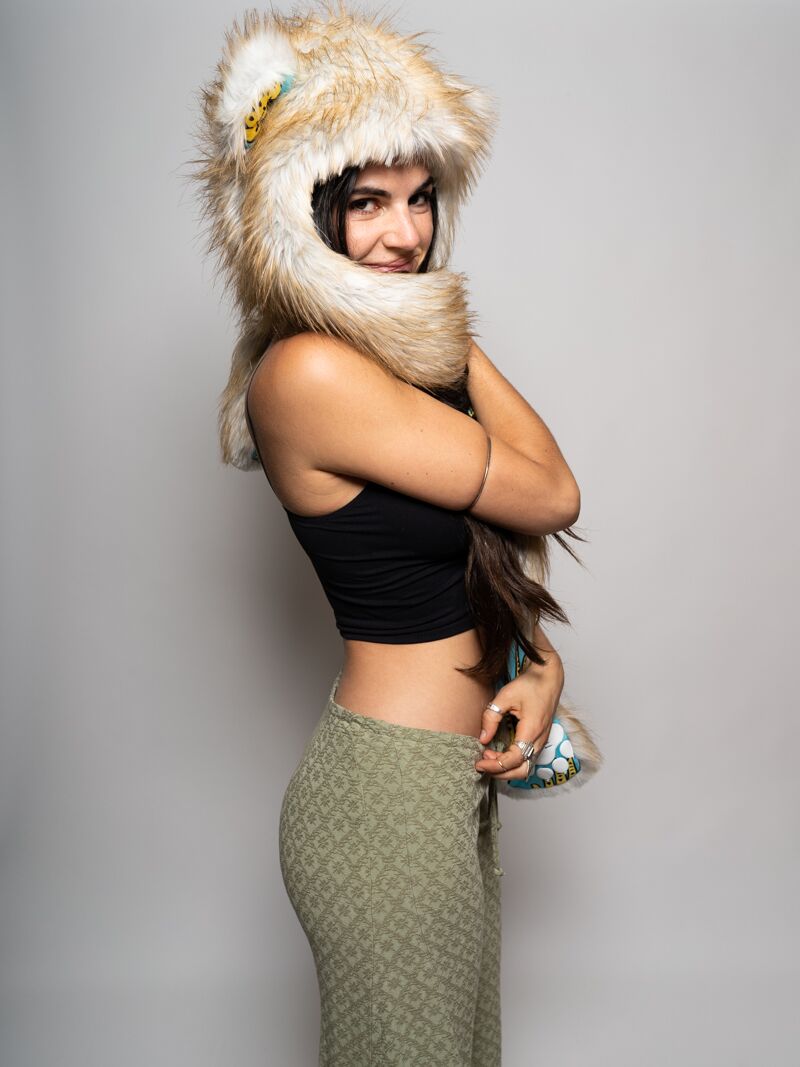 Woman wearing faux fur Golden Hamsa Bear Collector Edition SpiritHood, side view