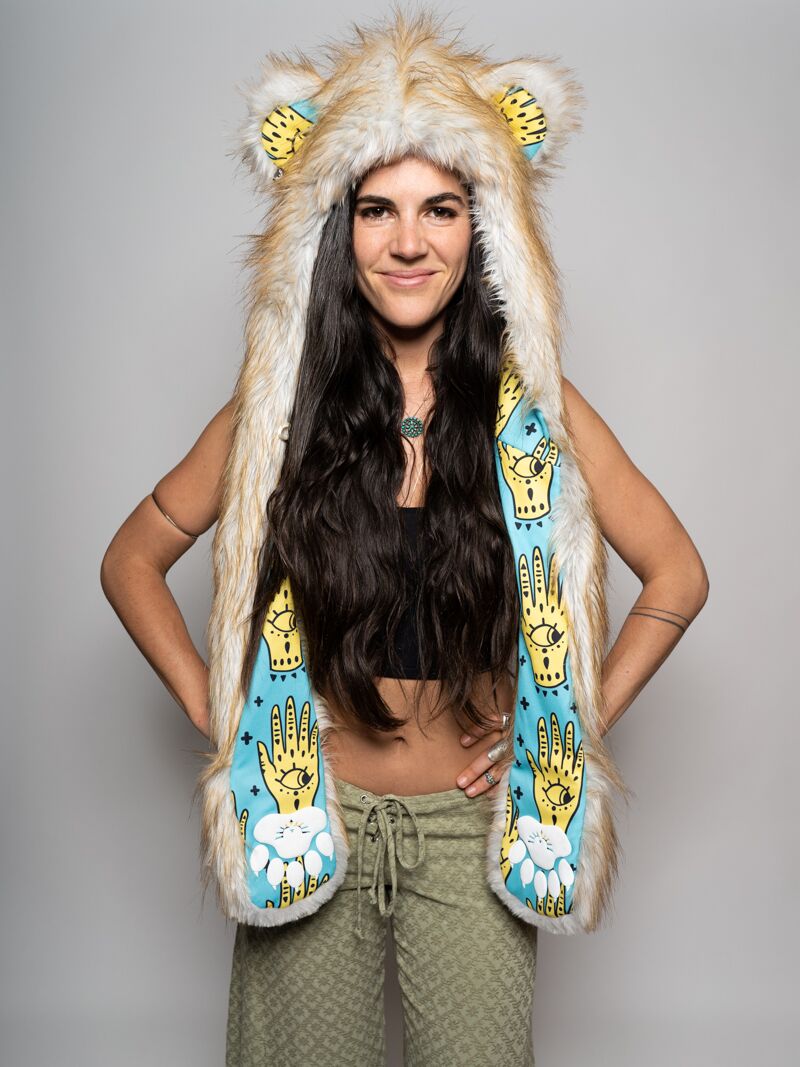 Woman wearing faux fur Golden Hamsa Bear Collector Edition SpiritHood, front view 3