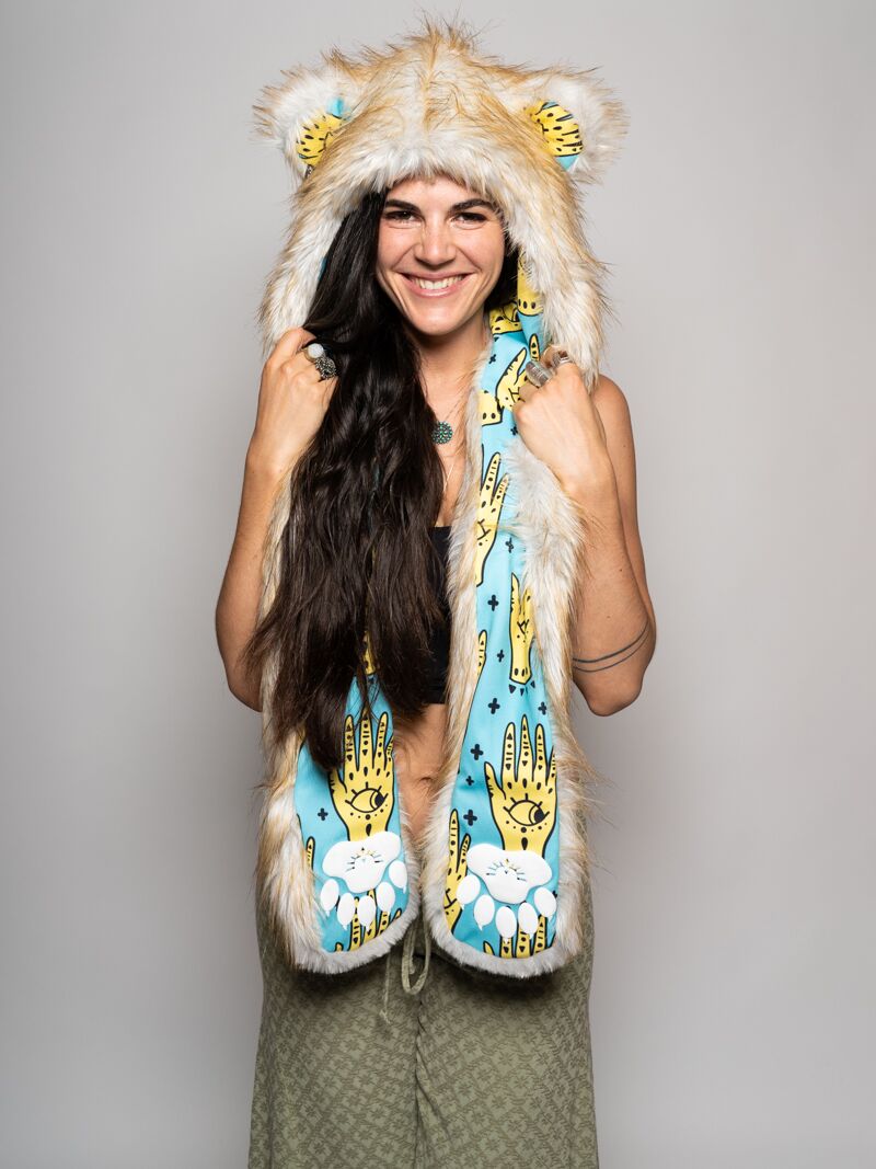 Woman wearing faux fur Golden Hamsa Bear Collector Edition SpiritHood, front view