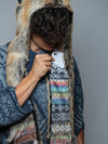 Man wearing faux fur Red Wolf Rainbow Collector SpiritHood, front view 2