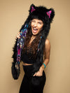 Woman wearing faux fur Bart Cooper Black Wolf Artist Edition SpiritHood, side view