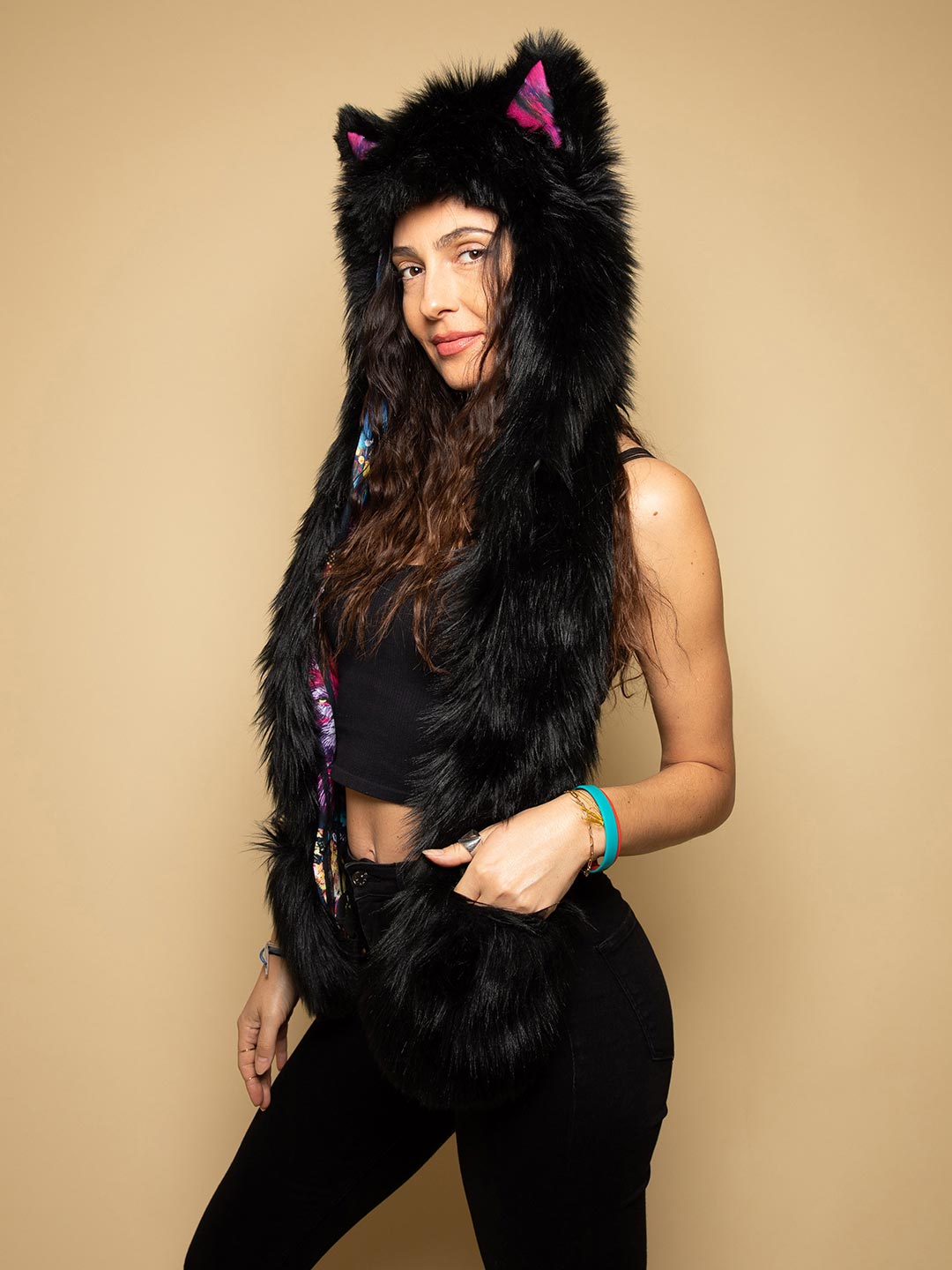 Woman wearing faux fur Bart Cooper Black Wolf Artist Edition SpiritHood, side view 1