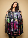 Woman wearing Bart Cooper Grey Wolf Faux Fur Coat Artist Edition, front view 3