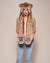 Woman wearing African Golden Cat Luxe Faux Fur Collector Edition Hood, front view 2