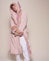 Man wearing Rose Quartz Wolf Luxe Classic Faux Fur Robe, front view 3