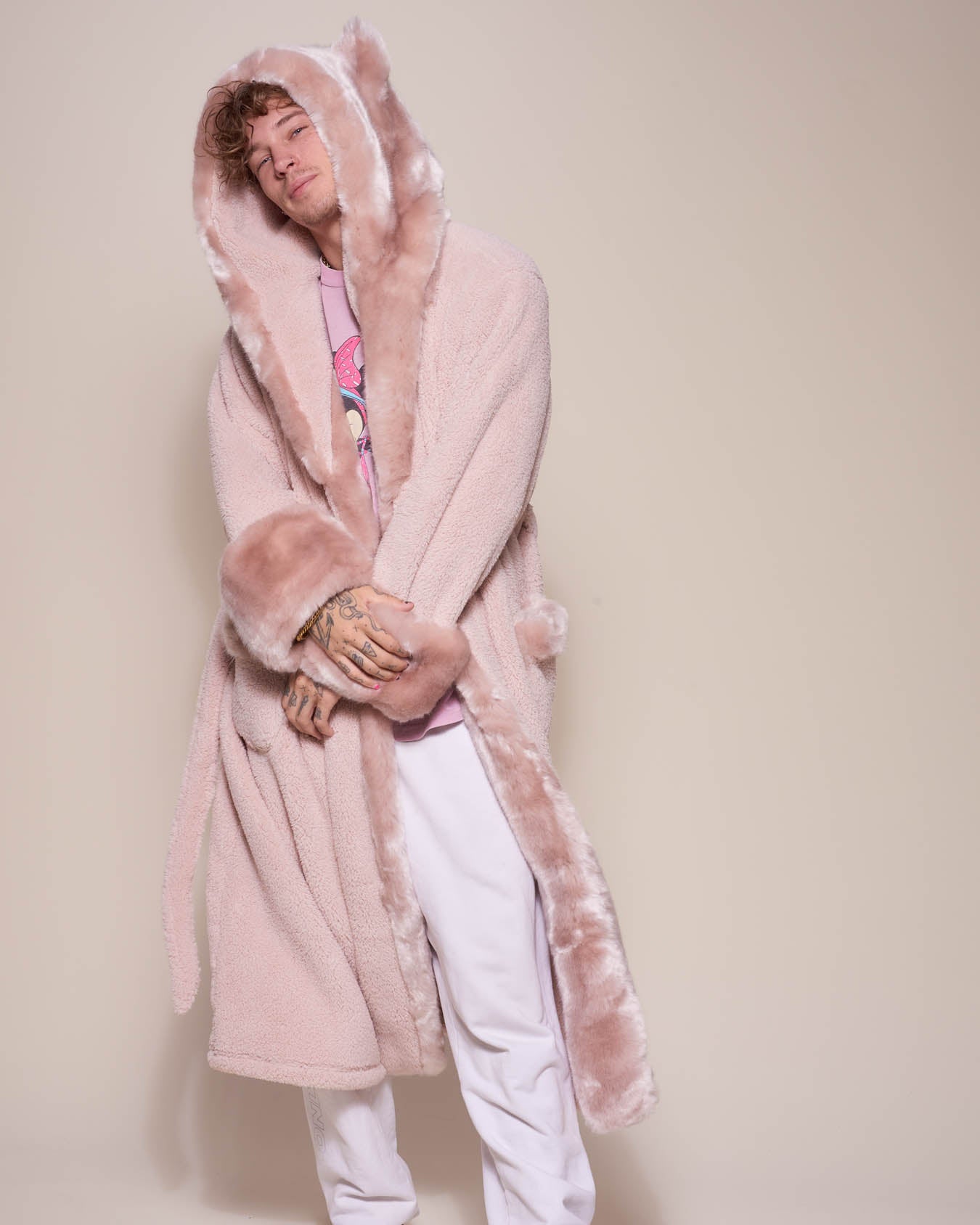 Man wearing Rose Quartz Wolf Luxe Classic Faux Fur Robe, front view 3