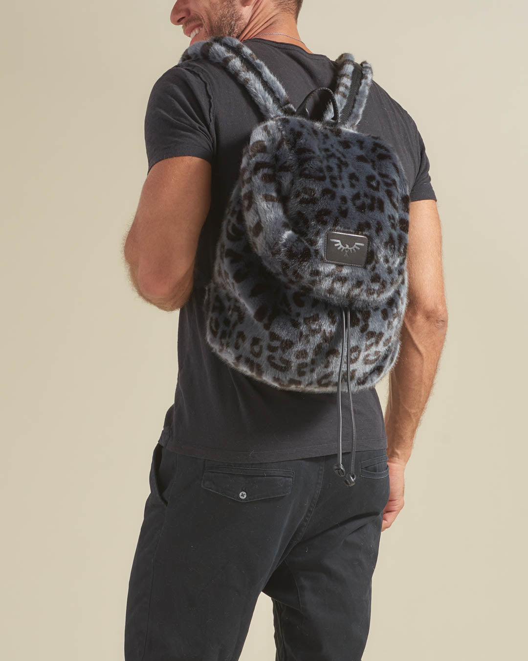 Man Wearing Slate Leopard Faux Fur Backpack