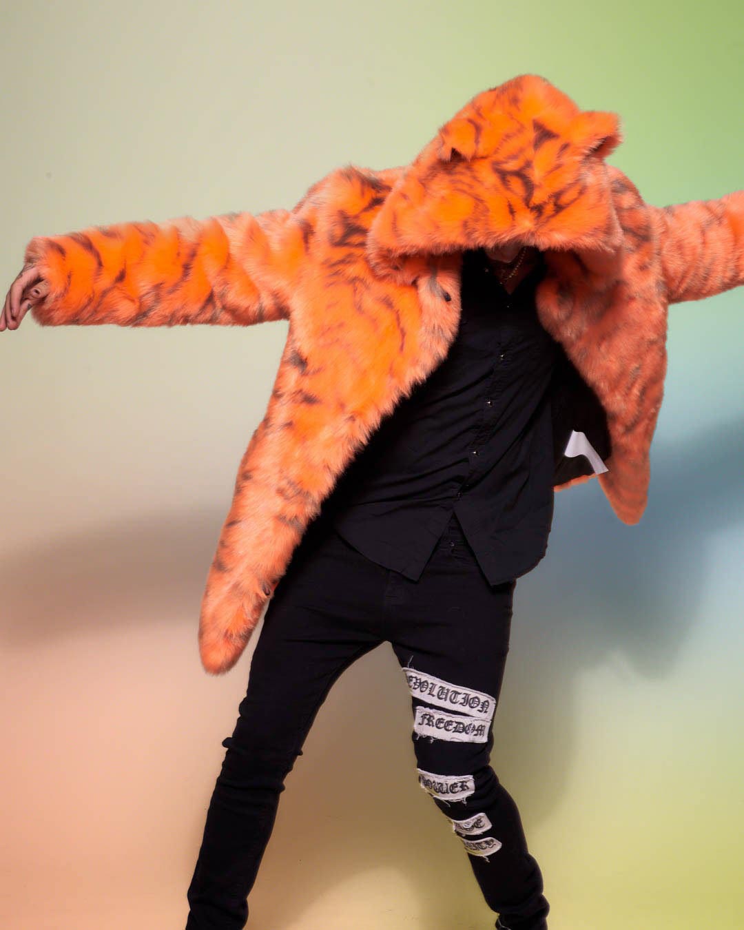 Man wearing Neon Tiger Limited Edition Classic Faux Fur Coat, front view 1
