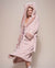 Woman wearing Rose Quartz Wolf Luxe Classic Faux Fur Robe, side view 4