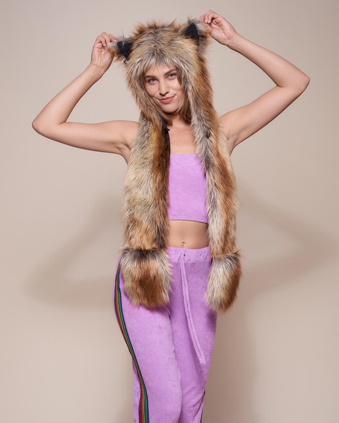 Woman Playfully Holding the Ears on the Hood of Red Fox Faux Fur