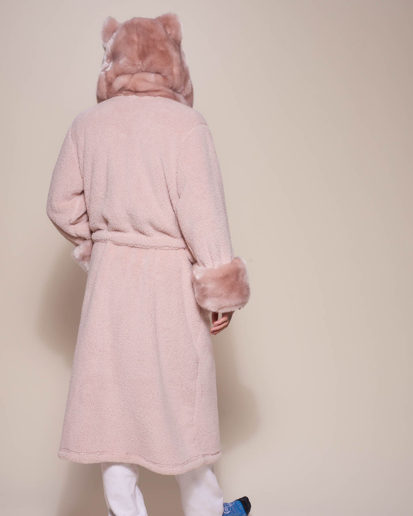 Man wearing Rose Quartz Wolf Luxe Classic Faux Fur Robe, back view