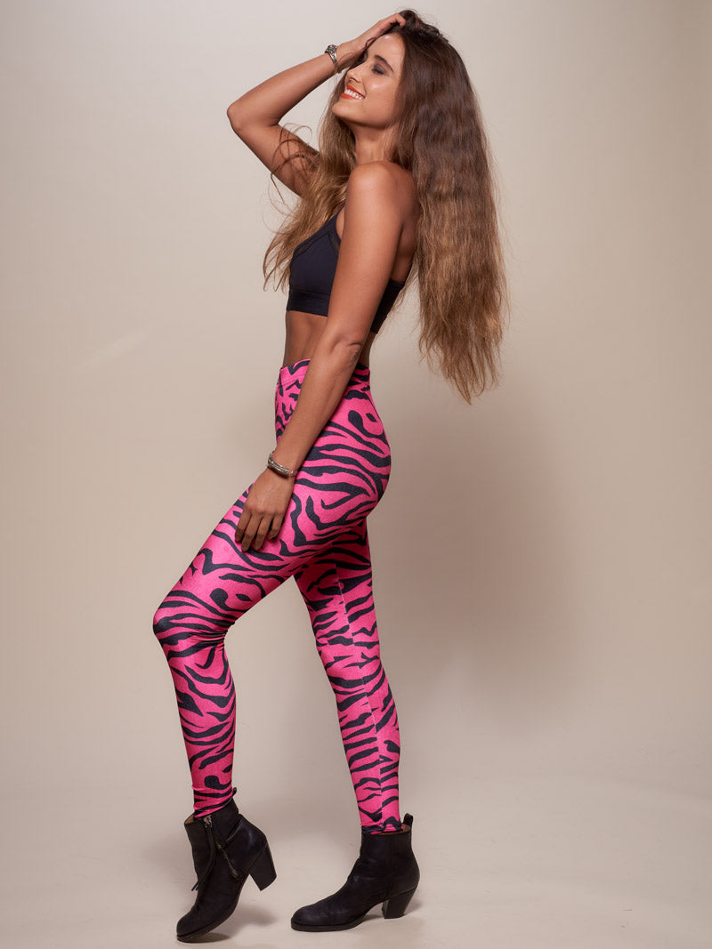 Female Wearing Velvet Neon Pink Zebra Leggings