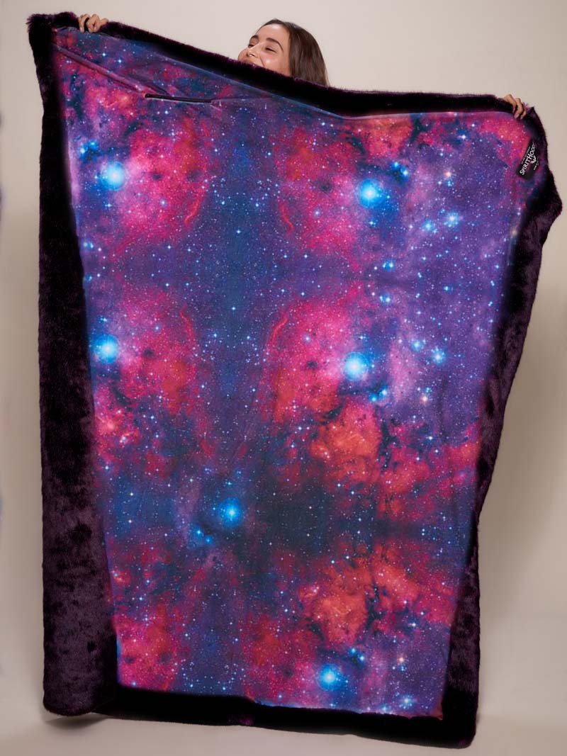Female Holding Luxe Midnight Wolf Limited Edition Galaxy Faux Fur Throw 