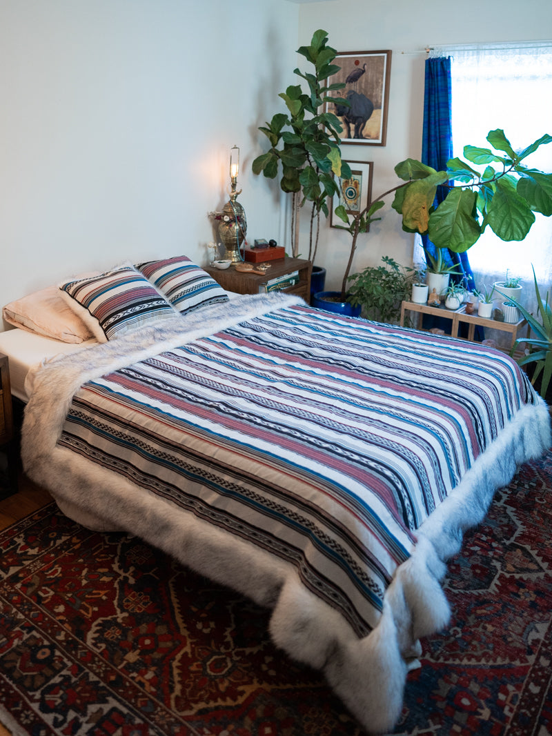Husky Baja Faux Fur Large Blanket on Bed