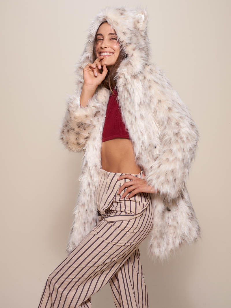 Woman wearing Classic Baby Snow Leopard Faux Fur Coat, side view