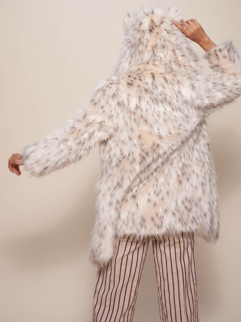 Woman wearing Classic Baby Snow Leopard Faux Fur Coat, back view