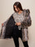 Woman wearing Grey Wolf Hooded Faux Fur Coat, front view 3