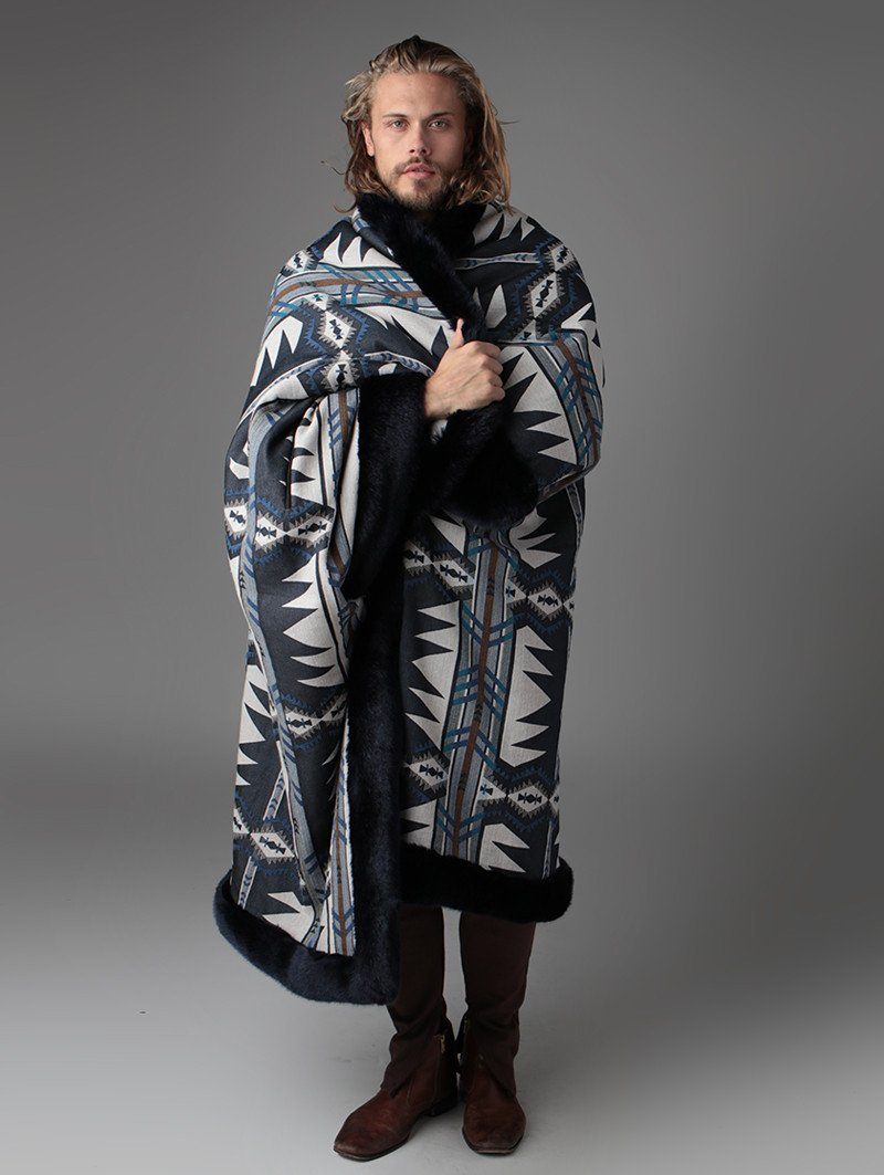 Male Model Wrapped in Indigo Fox Luxe Faux Fur Throw