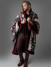 Man wearing faux fur Luxury Garnet Throw