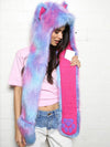 Woman wearing faux fur Festie Bestie Cotton Candy Wolf SpiritHood, side view