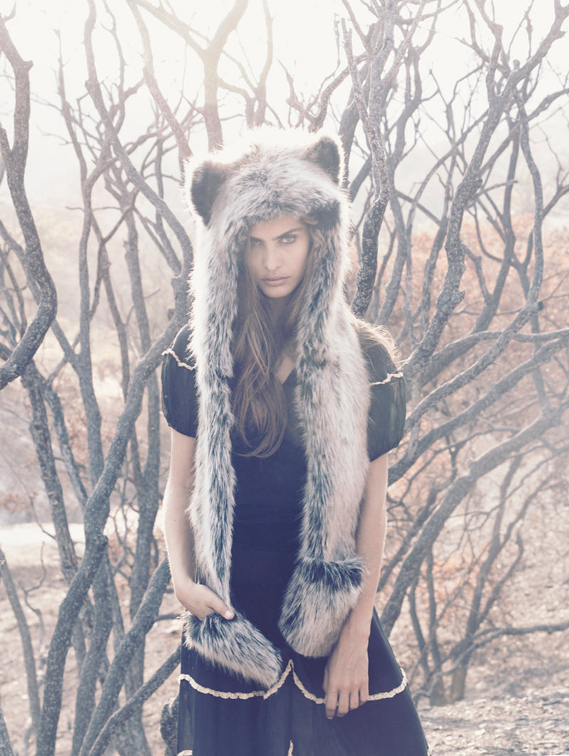 Grey Wolf Hooded Faux Fur on Woman Standing Outside